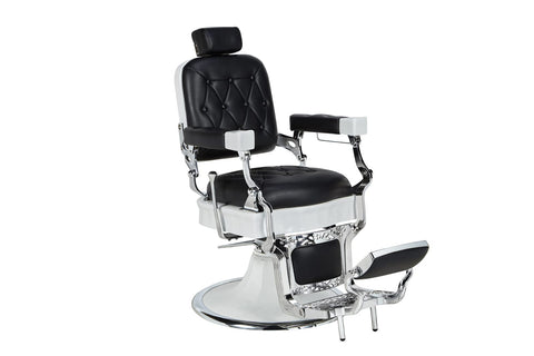 Silla de barbería de cuero negra con estructura de plata.